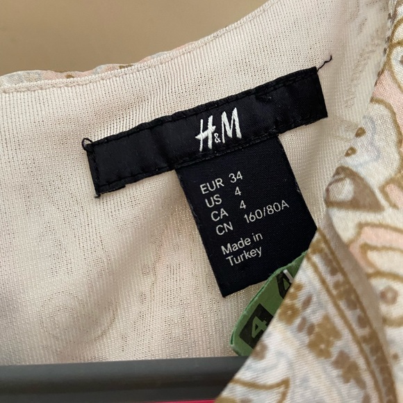 H&M pale cream and pink dress size 4 with ruffle. - Picture 4 of 4